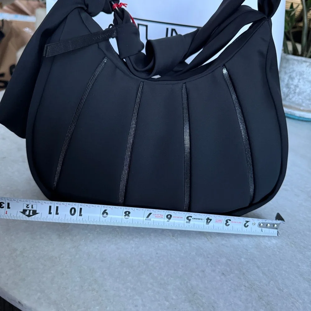 TUMI Asra Small Hobo Bag Black Nylon Pleated Knotted Shoulder Strap Handbag NEW